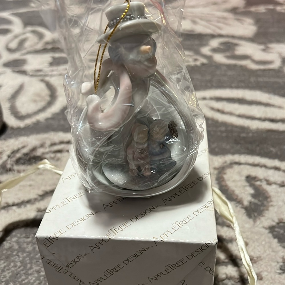 Appletree design porcelain snowman Christmas ornament new in box.